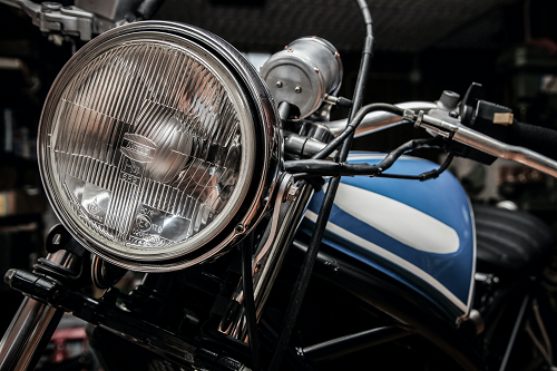 a close up of a blue motorcycle